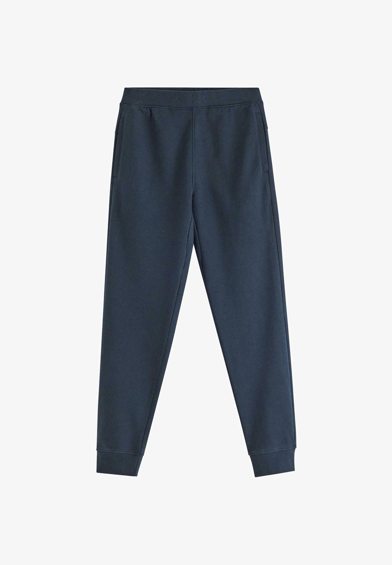Pantalon de jogging bleu foncé fuselé avec taille élastique, poches latérales et poignets côtelés aux chevilles.