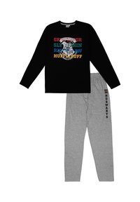 Schwarzes Langarmshirt mit mehrfarbigem Schriftzug und Hogwarts-Wappen, kombiniert mit grauen Schlafanzughosen, die ein "H"-Logo und Schriftzüge an der Seite tragen.