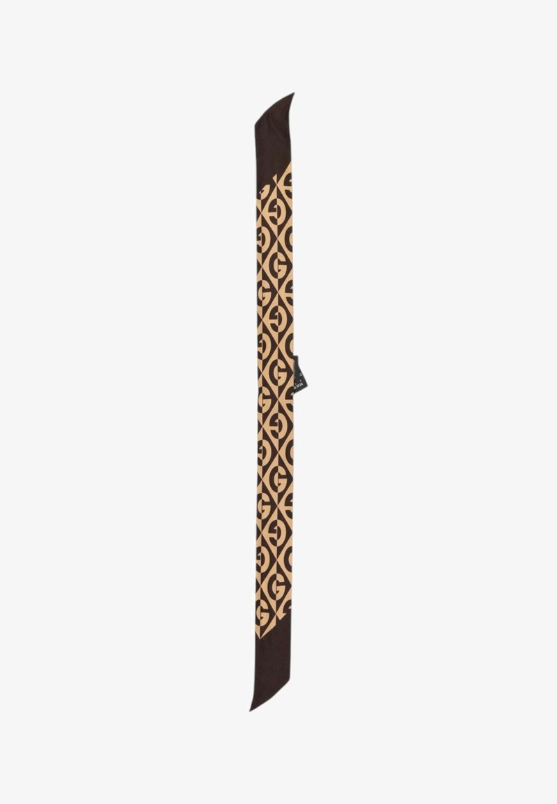 Longue écharpe marron et beige avec un motif géométrique de lettres G entrelacées, avec une petite étiquette noire sur le côté.