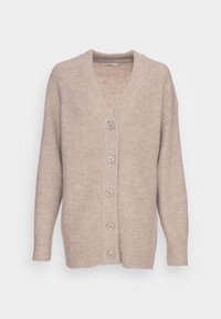 Cárdigan de punto beige con cuello en V, mangas largas y cinco botones. Presenta textura acanalada y un ajuste relajado.