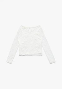 Valkoinen pitkähihainen crop-top, jossa on tähkäkuvio, valmistettu läpinäkyvästä kankaasta. Siinä on pyöreä kaula-aukko ja pieni avaus takana.
