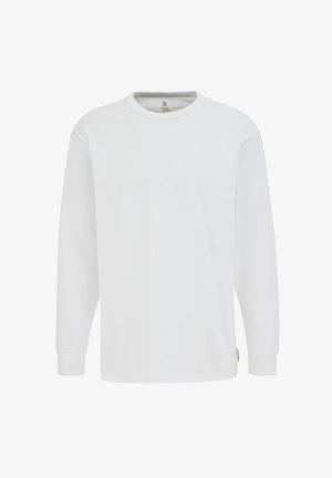 T-shirt blanc à manches longues avec un col rond, fabriqué en tissu de coton lisse. Comprend des poignets côtelés et une petite étiquette de marque à l'ourlet.