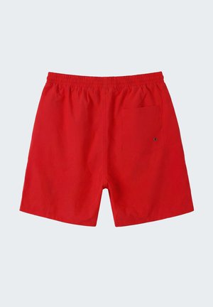 Rode zwemshorts met elastische taille en een enkele achterzak voorzien van een klein metalen oogje voor afwatering.