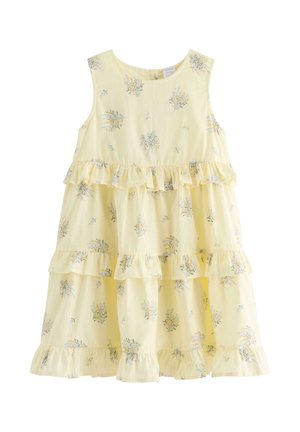 Ærmeløs gul kjole til småbørn med blomsterprint og lagdelte flæsedetaljer på krop og skørt.