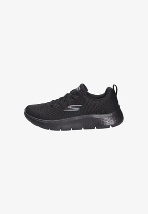 Black athletic shoe with a breathable mesh upper, thick cushioned sole, and textured detailing on the side; features a lace-up design.