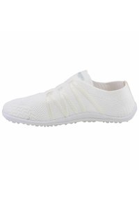 White athletic shoe with a mesh upper, featuring elastic bands for support, a textured sole, and a minimalist design without a tongue.