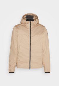 Beige hooded jacket with a front zipper, featuring a black zipper and cuffs. Smooth texture with minimalistic design and two front pockets.