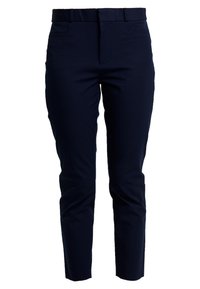 Pantaloni blu navy con una vestibilità slim, realizzati in tessuto liscio. Presentano una parte anteriore piatta, passanti per cintura e due tasche laterali. Design alla caviglia.