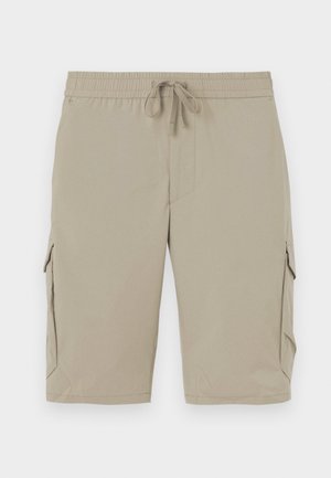 Beige cargo shorts med elastisk talje og snor. Har sidelommer og et glat, let stof.