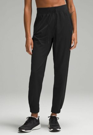 Pantalones deportivos - black