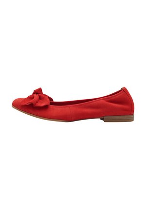Red suede ballet flat with a rounded toe, featuring a bow detail on the front and a low wooden heel. Smooth texture and minimalistic design.