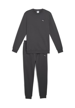 Mørkegrå tracksuit lavet af blødt stof; langærmet top og tapered bukser med manchetter. Har et lille, sort Puma-logo på begge dele.