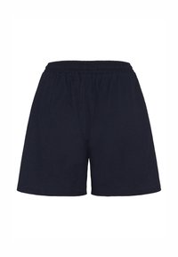 Shorts tissés bleu marine avec une taille élastique, présentant une texture douce et une coupe décontractée, se terminant juste au-dessus du genou.