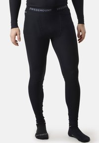 Black thermal leggings with a ribbed texture and an elastic waistband featuring "SWEDEMOUNT" branding. Fitted design.