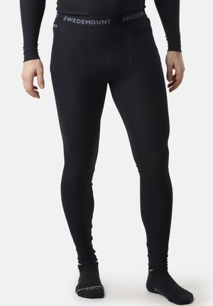 Schwarze Thermoleggings mit Rippstruktur und einem elastischen Bund, der mit "SWEDEMOUNT"-Branding versehen ist. Enganliegendes Design.