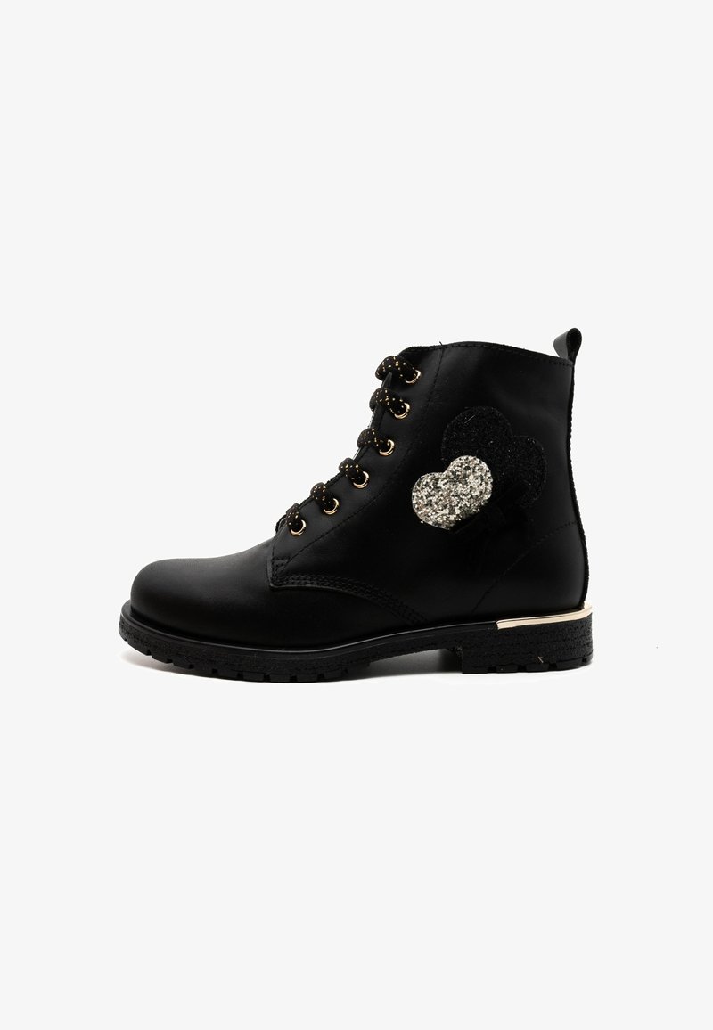 Black ankle boot with a smooth leather finish, gold eyelets, and black and silver heart appliqués. Features a textured sole and a low heel.