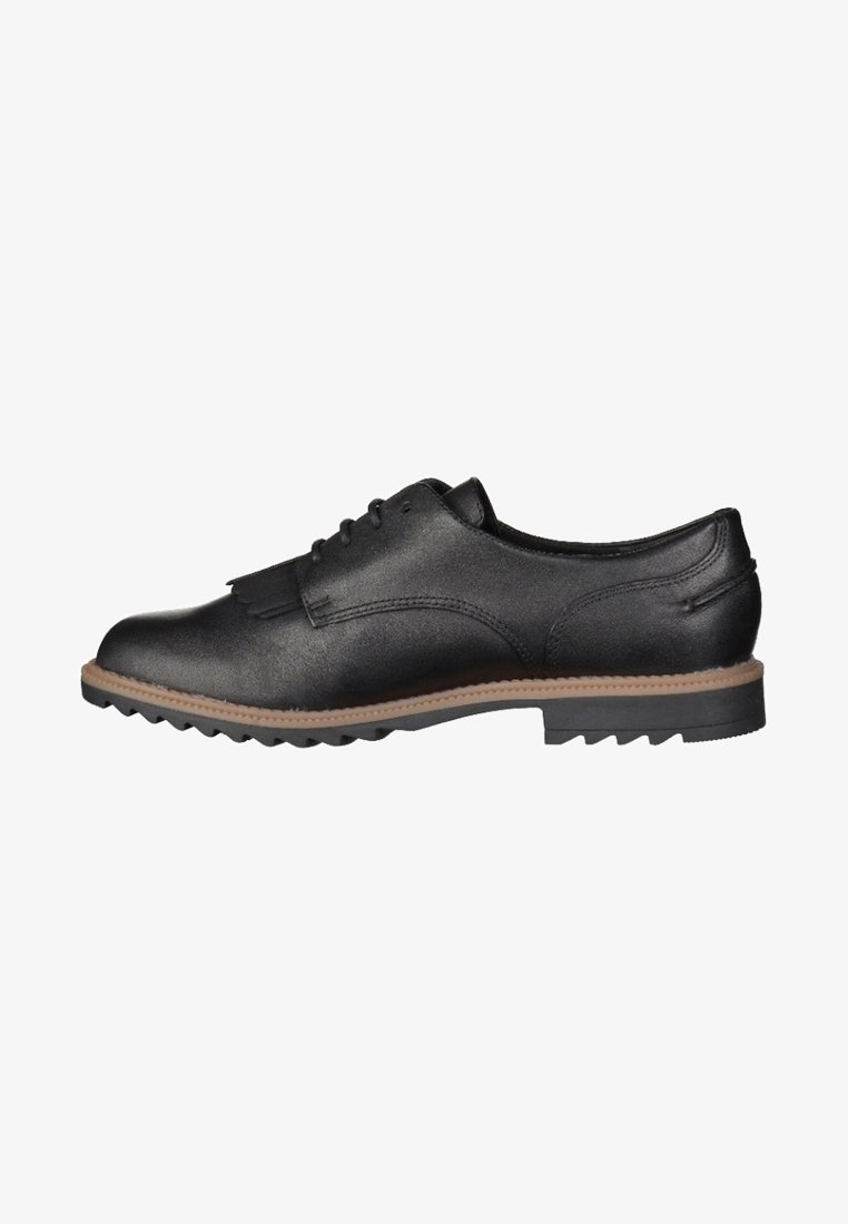 Chaussure habillée pour homme en cuir noir avec franges et laçage à l'avant, semelle intermédiaire beige et semelle extérieure en caoutchouc noir cranté, vue de l'intérieur.