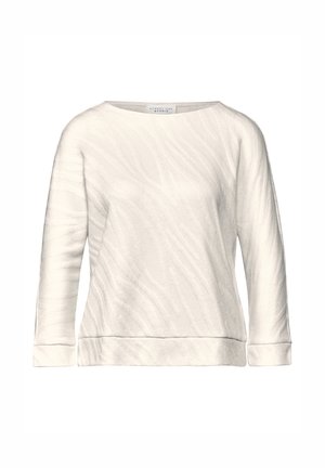 Krémové dlouhé tričko s lodními výstřihy, s texturovaným vzorem, pružným lemem a manžetami. Vyrobeno z měkké látky.