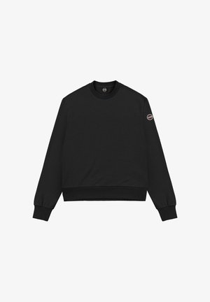 Black long-sleeve crewneck sweatshirt with ribbed cuffs and hem, featuring a small round logo patch on the upper left sleeve.
