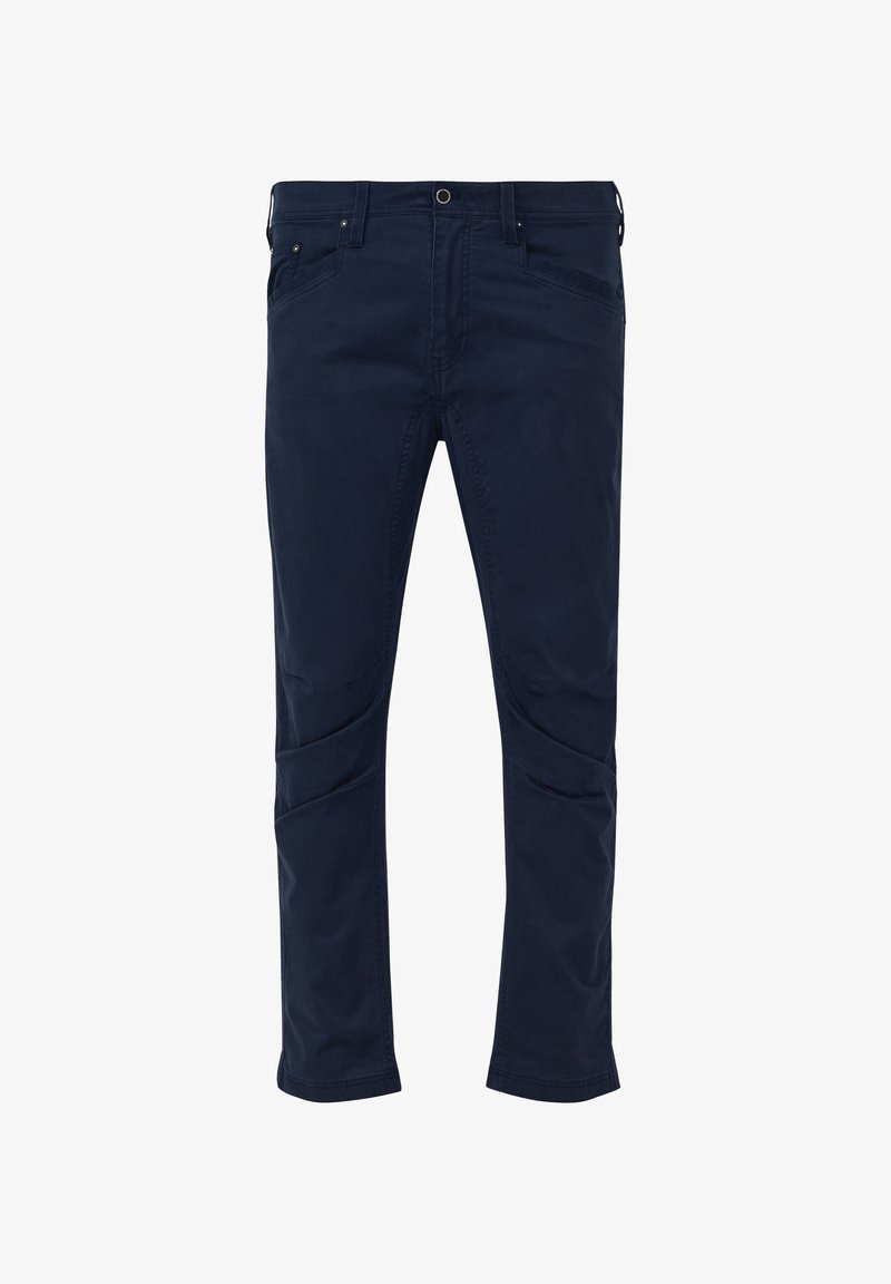 Pantalon en coton bleu marine à coupe slim, avec poches latérales inclinées et surpiqûres décoratives sur les cuisses. Texture lisse, taille standard.