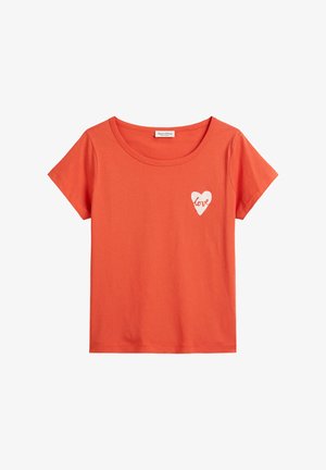 Orange short-sleeve t-shirt made of cotton, featuring a white heart graphic with the word "love." Smooth fabric and crew neckline.
