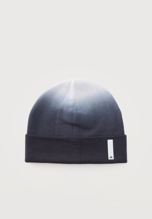 Bonnet en laine avec un dégradé du noir au blanc et un revers noir comportant un petit patch logo rectangulaire blanc à l’avant.