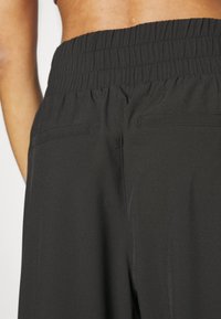 GAP Tygbyxor - black