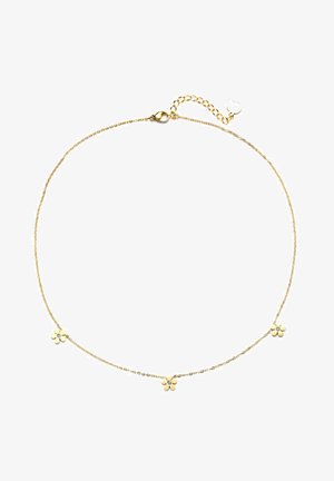 Collier en chaîne dorée avec trois petites accents floraux aux pétales blancs et gemmes centrales, le tout sur un délicat design de chaîne.