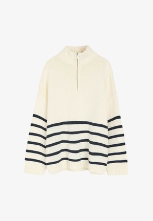 Kremowy sweter z wysokim kołnierzem i pół-zamkiem, z poziomymi granatowymi paskami na rękawach. Gruba dzianina i ściągacze.