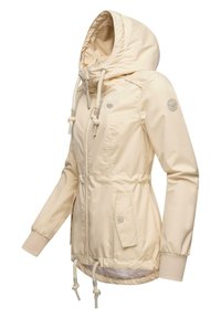 Ljusbeige huva jacket med dragsnören, försedd med dragkedja framtill, elastiska ärmslut och två sidofickor. Slät, vattentålig tyg.