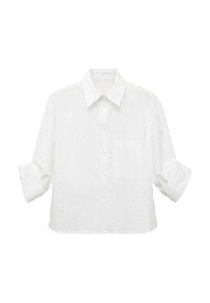 Witte kortekraag shirt met een puntige kraag, met een subtiel stippenpatroon en een borstzak. Lichtgewicht stof, oversized pasvorm.