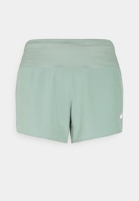 Light green athletic shorts with a smooth texture, elastic waistband, and logo accent on the side. Simple design, thigh-length cut.