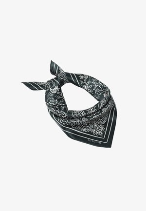 Czarna jedwabna bandana z białymi wzorami paisley i kwiatowymi, złożona i związana luźnym węzłem.