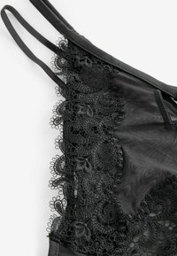 Next Trusser - black