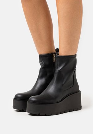 Guess, Bottines compensées - black