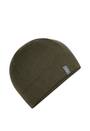 Olive green knit beanie with a small grey fabric tag on the edge, shown against a white background.