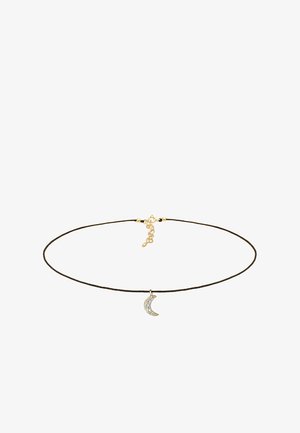 Guldfarvet choker halskæde med en sort snor, med en halvmåne charm udsmykket med klare rhinsten. Justerbar clasp.