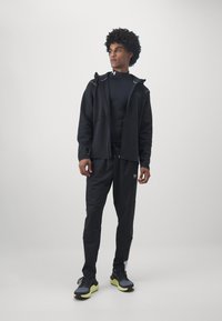 Under Armour UNSTOPPABLE FLEECE - Zip-up sweatshirt - black