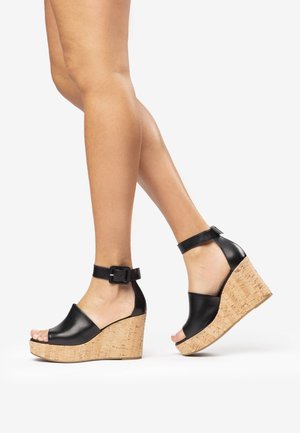 NeroGiardini, Sandales à plateforme - black