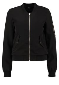 Black bomber jacket made from smooth fabric, featuring a front zipper, two side pockets, and ribbed cuffs and hem. Minimalist design with no patterns.