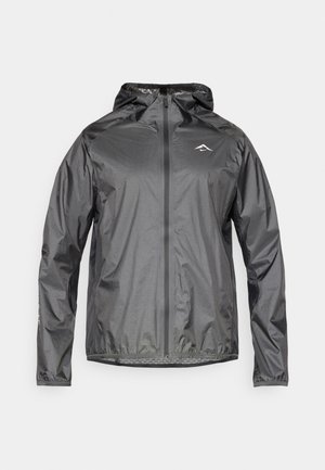Lightweight, hooded jacket in metallic gray with a front zipper and elastic cuffs. Features a small reflective logo on the upper chest.