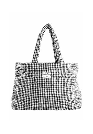 Quilted black-and-white gingham tote bag with two padded handles and a "Milano Via Dante 1982" label on front.