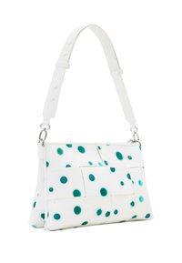 Borsa bianca con pois turchesi, dotata di una superficie testurizzata, design piatto, tracolla rimovibile e chiusura con zip.
