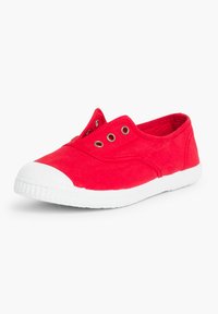 Punane kangast slip-on-jalad, millel on valge kummine varvas ja tald. Omab õhutusavasid ja pehmet tekstiilist sisemust.