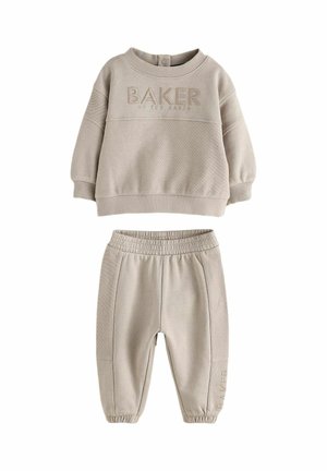 Beige toddler sweatshirt and pants set with elastic waistband and cuffs, featuring "BAKER" embroidered on the chest and pant leg.