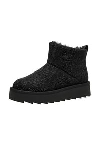 Bottines noires en tissu texturé ornées de petits strass. Elles possèdent une semelle épaisse et une bordure en fausse fourrure douce sur le haut.