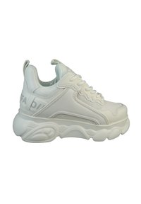 White sneakers featuring a textured upper, padded collar, and a thick, cushioned sole. Notable side design element with branding detail.