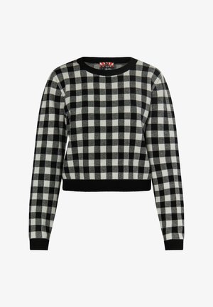 Mustra mustvalge ruuduline sviiter, millel on ümar kaelus ja pikad varrukad. Omab lühendatud disaini ja ribakudumist varruka- ning allääres. Pehme tekstuur.