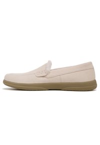 Light beige suede slip-on shoe with beige rubber sole. Features a soft fur accent on the front and minimal stitching details.