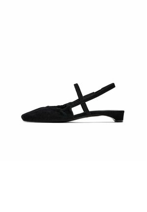 Black suede slingback shoes with a pointed toe and a slim strap across the ankle. Flat heel and soft texture. Minimalistic design.
